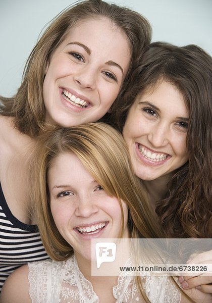 Close up of teenage girls smiling