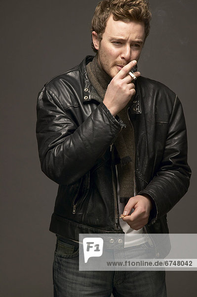 Man Smoking a Cigarette  Toronto  Ontario