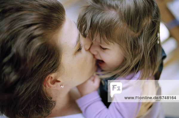 Mother Kissing Daughter  Vancouver  British Columbia
