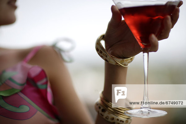 Woman holding Cocktail
