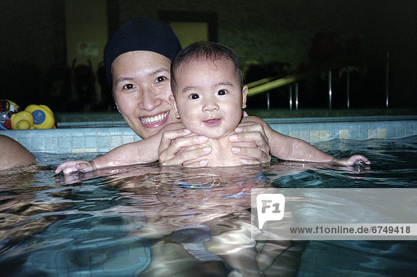 Mother and Child in Swimming Pool