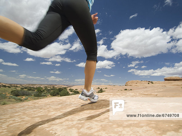 Woman jogging in desert