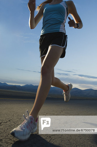 Woman in athletic gear running