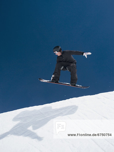 Mann  Snowboard  Himmel