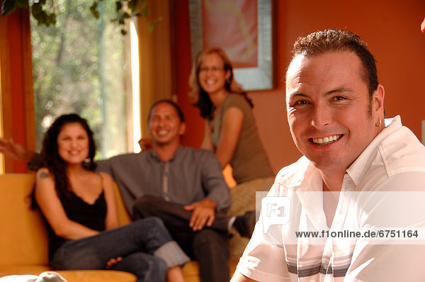 Close-up of Man Friends in Background