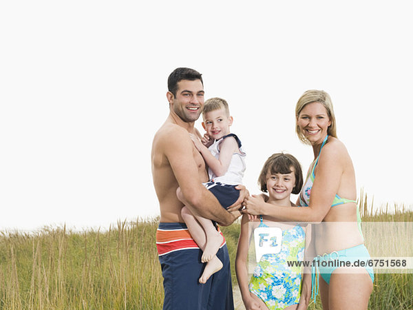 Portrait of family in bathing suits