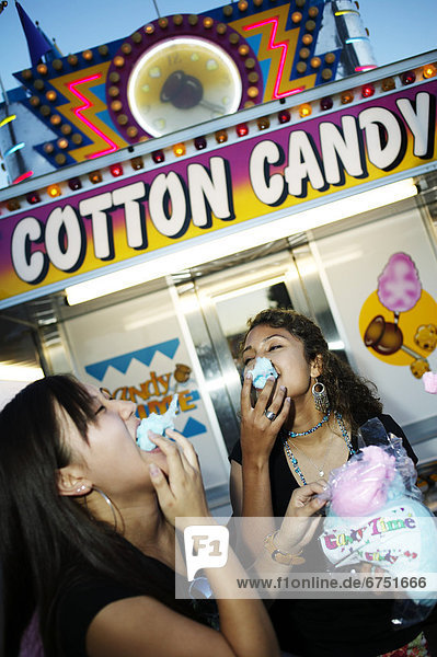 Girlfriends Enjoying Cotton Candy