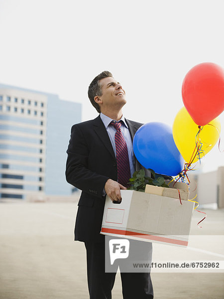 Geschäftsmann  Luftballon  Ballon  halten