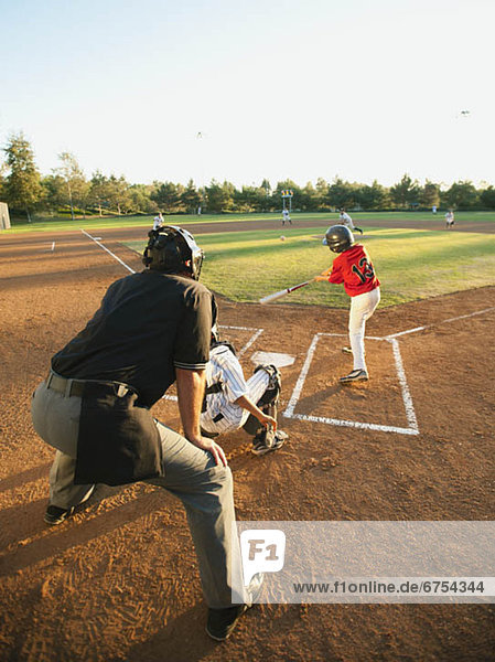 USA  California  Ladera Ranch  boys (10-11) playing baseball