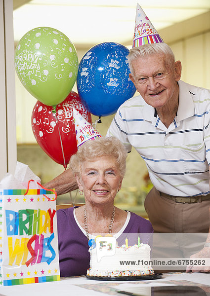 Senior couple celebrating birthday
