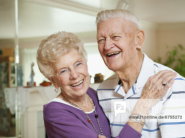 Portrait of senior couple laughing