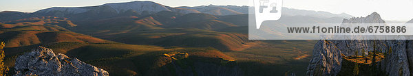 Panoramic over Sapper hill near Engineer Creek in Autumn  Dempster Highway  Yukon