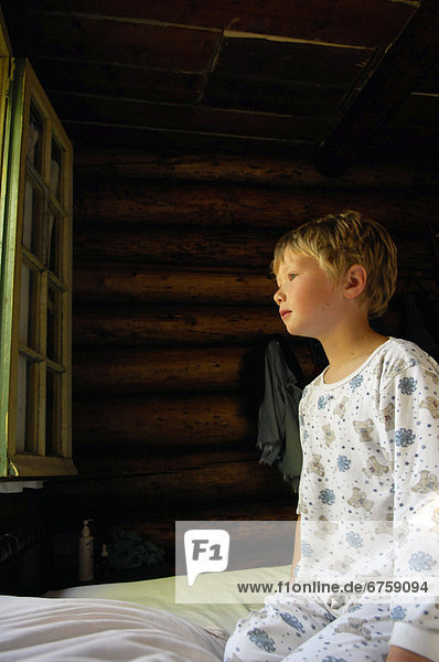 Young Boy Looking out a Window  Lac des Neiges  Quebec