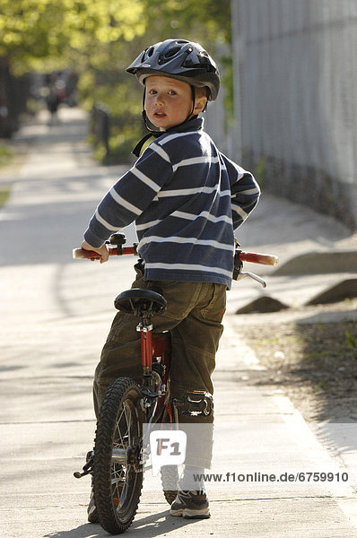 Young Boy Riding Bicycle  Toronto  Ontario