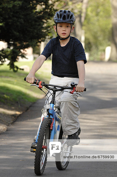 Boy Riding Bicycle  Toronto  Ontario