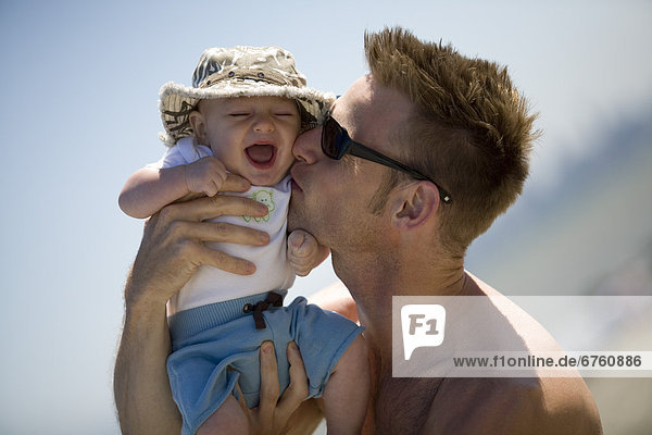 Father and Baby at a Beach  Spanish Banks  Vancouver  British Columbia