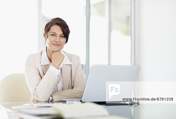 Portrait of businesswoman with laptop
