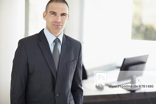 Portrait of businessman in office environment