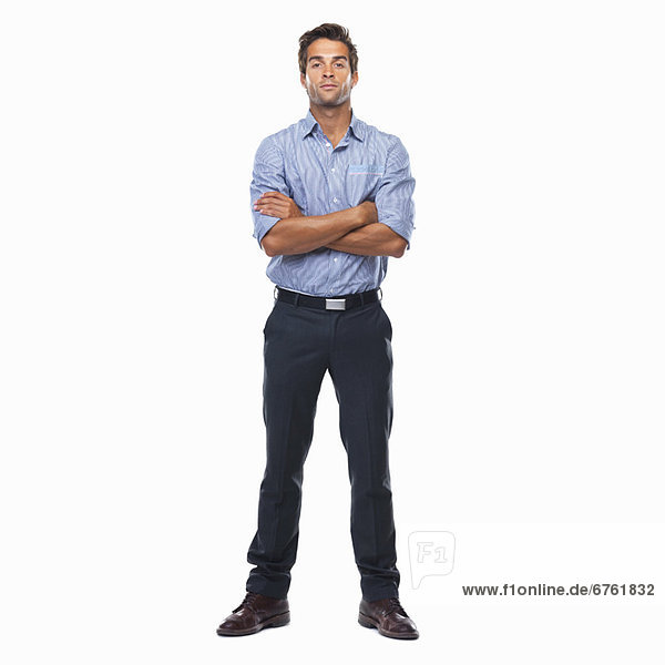 Confident business man standing with arms crossed