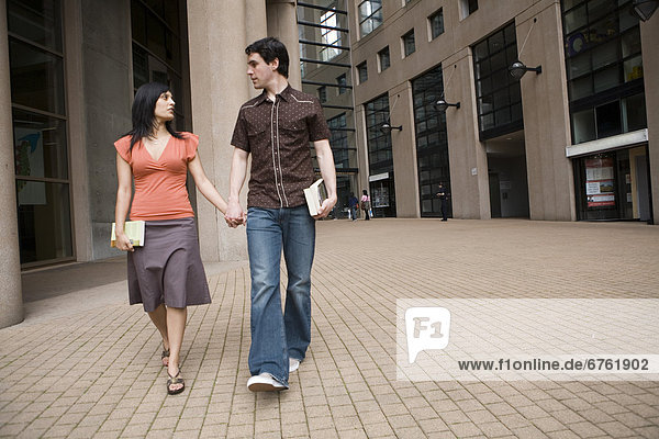 Couple Walking through Public Library  Vancouver  British Columbia