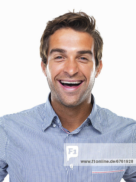 Studio portrait of cheerful business man smiling