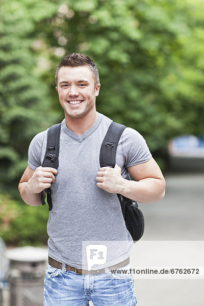 Portrait of male college student smiling