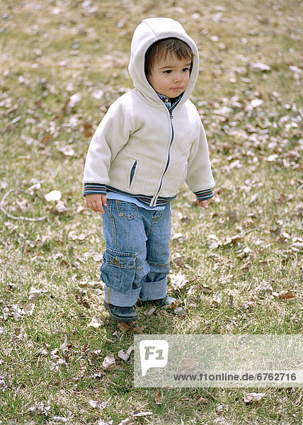 Little Boy Walking on Grass  Rene Levesque Park  Montreal Quebec