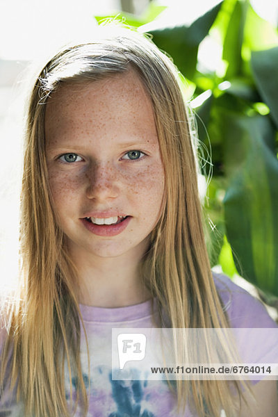 Portrait of smiling girl (10-12)