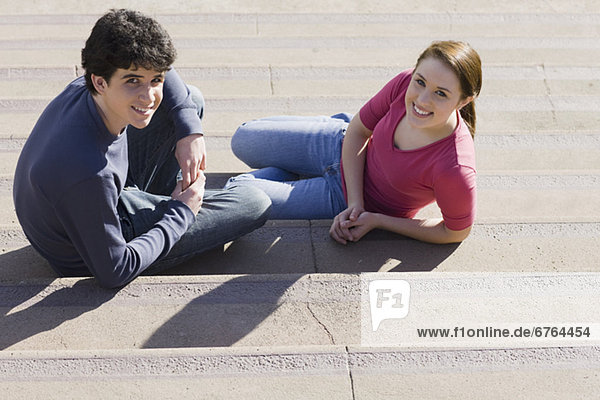 Friends sitting on steps