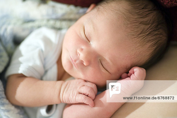 Closeup of a Newborn Baby Boy Sleeping