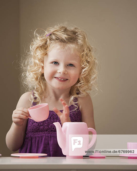 USA  Utah  Lehi  girl (2-3) playing with toy crockery