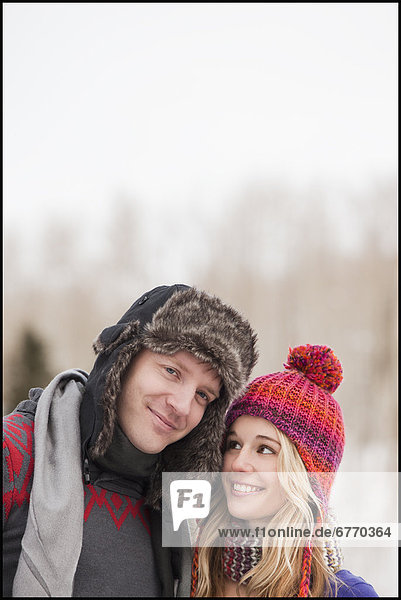 USA  Utah  Salt Lake City  young couple in winter clothing