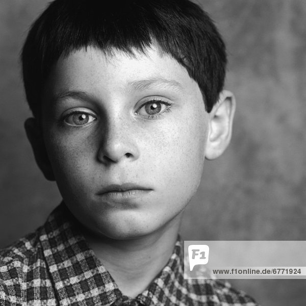 Portrait of a serious young boy