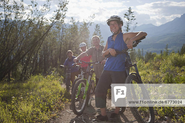 Canada  British Columbia  Fernie  Group of four friends enjoying mountain biking