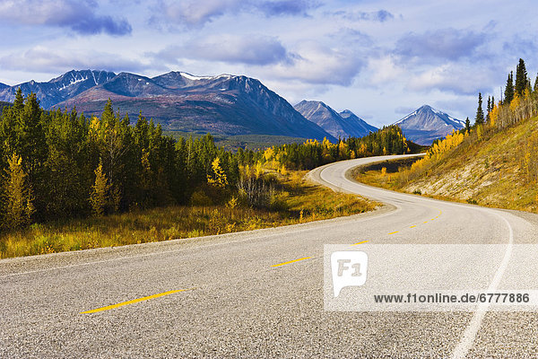 Alaska Highway and mountain landscape  Yukon