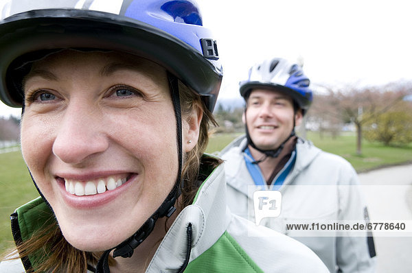 Happy Couple Riding Tandem Bike  Vancouver  British Columbia