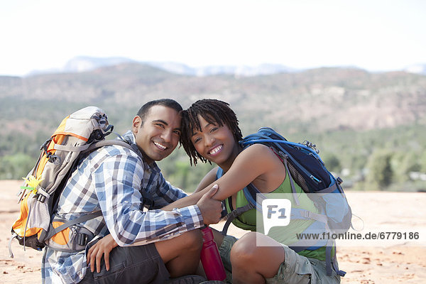 USA  Arizona  Sedona  Young couple hiking and enjoying desert scenery