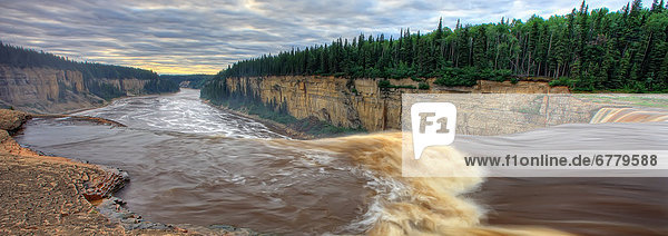 Panoramic image of the Hay River falling over Alexandra Falls with Hay River Gorge in distance  near Hay River  Northwest Territories