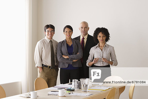 Portrait of business team in board room