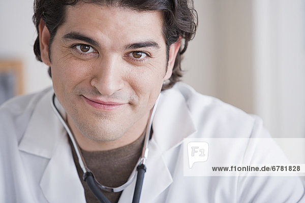Portrait of smiling male doctor