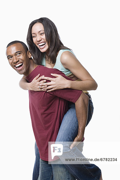 Portrait of young couple enjoying together