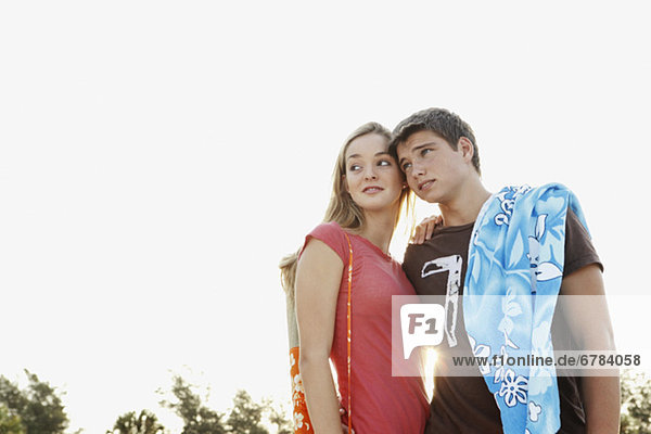 Young couple posing at beach