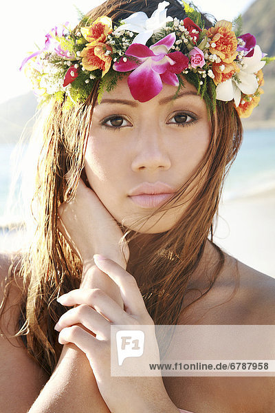 Hawaii  Oahu  Headshot of beautiful Pacific Island woman wearing haku.