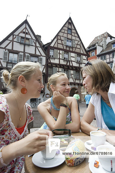 Three women in a cafe  Colmar  Alsace  France  Europe