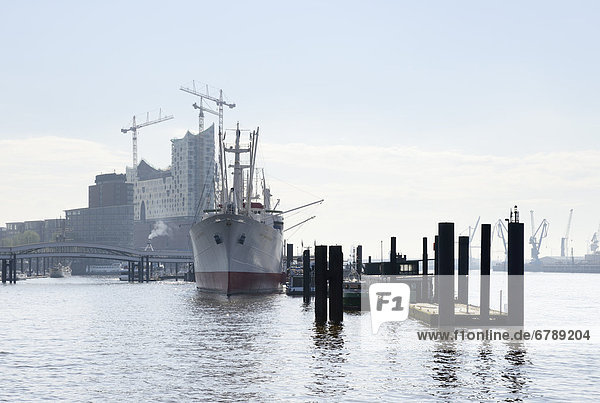 Museum cargo ship Cap San Diego  Elbe Philharmonic Hall under construction  Port of Hamburg  Hamburg  Germany  Europe