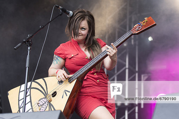 Marianne Sveen with a balalaika from the Norwegian girl band Katzenjammer performing live at Heitere Open Air in Zofingen  Aargau  Switzerland  Europe