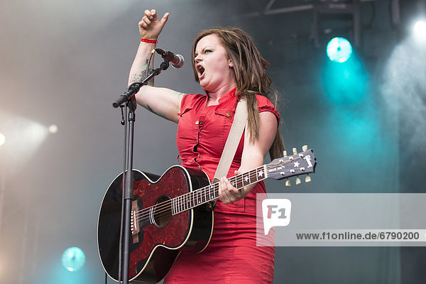 Marianne Sveen with a guitar from the Norwegian girl band Katzenjammer performing live at Heitere Open Air in Zofingen  Aargau  Switzerland  Europe