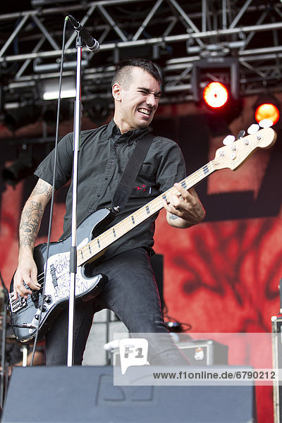 Bass player Chris Barker from the U.S. political punk band Anti-Flag performing live at Heitere Open Air in Zofingen  Aargau  Switzerland  Europe