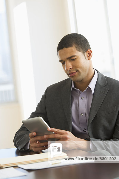 Businessman using tablet pc