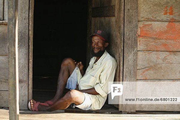Tasbapauni  Nicaragua  Man Relaxing In Doorway